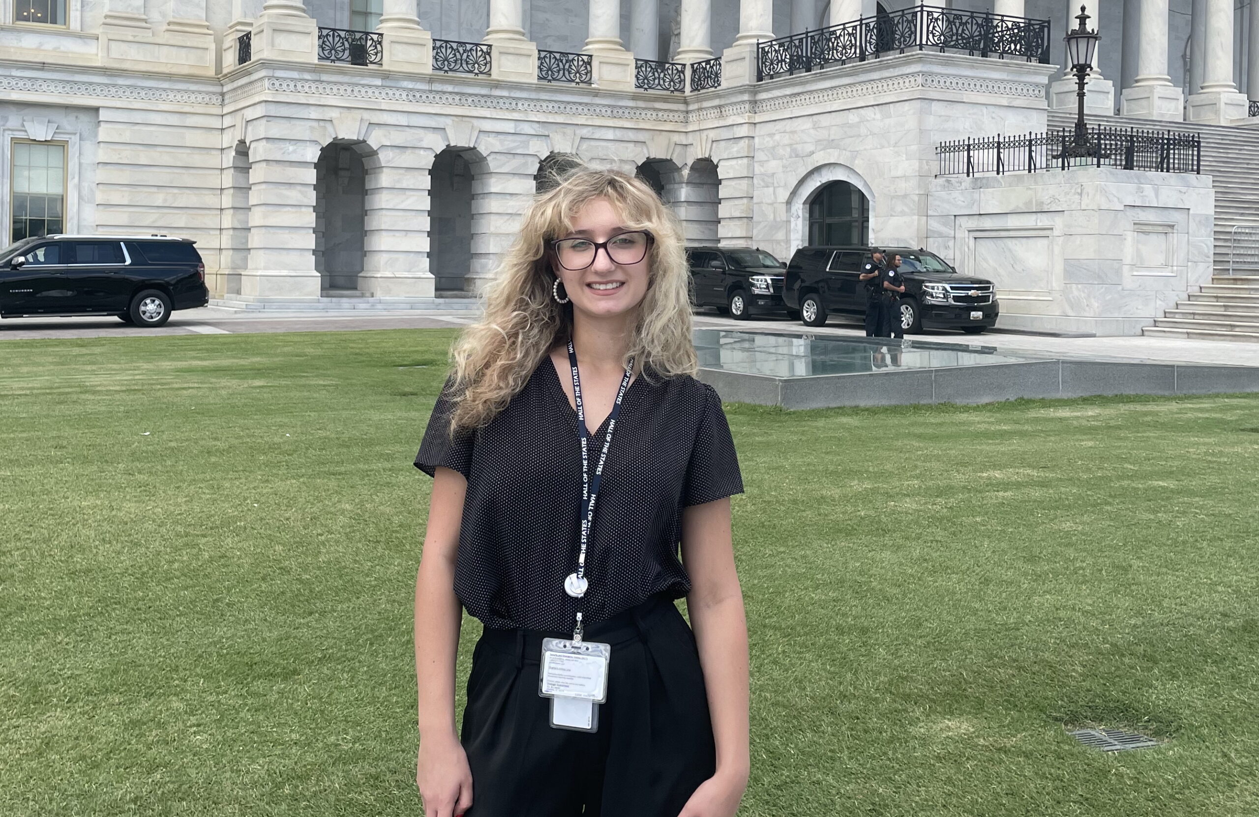 Scholarship recipient Megan Acker stands in front of the U.S. Capitol Building in Washington, DC.